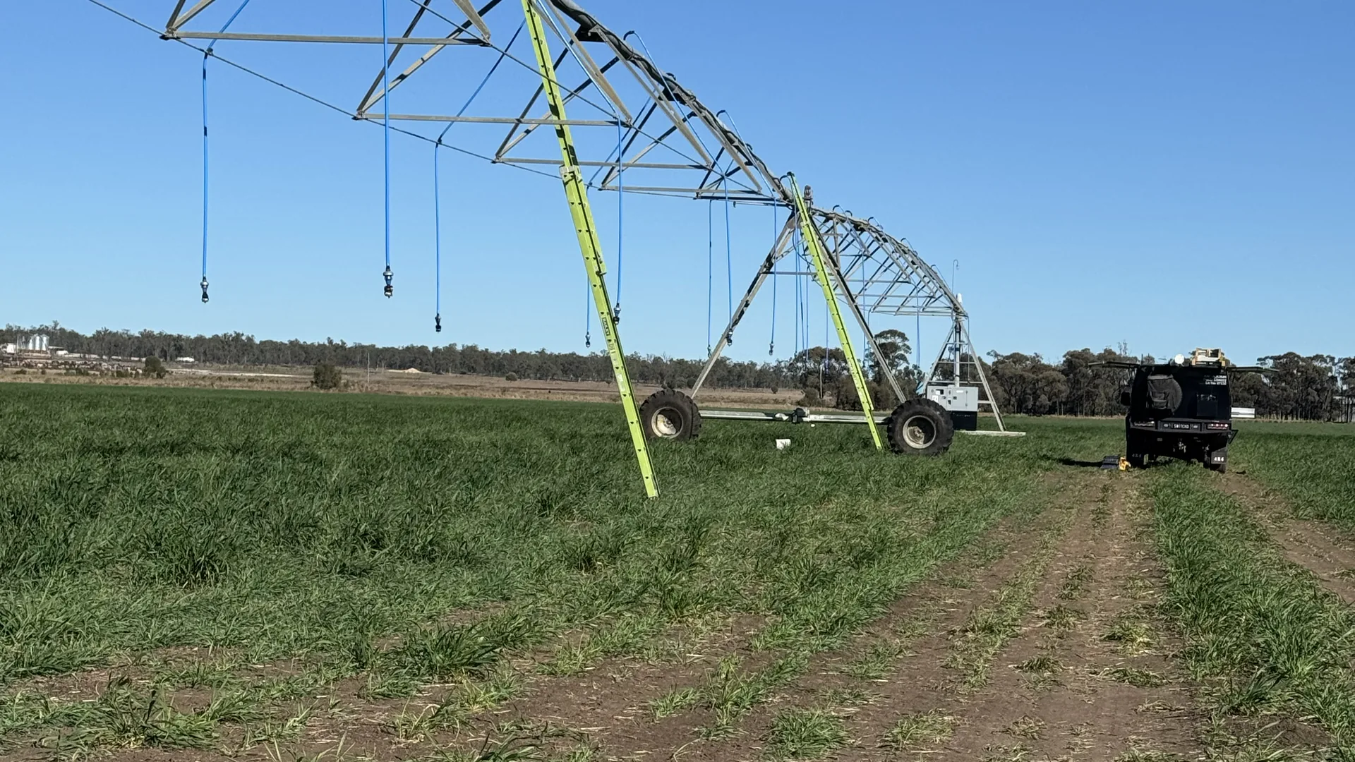 A centre-pivot span reaching across a cropping paddock in the country Switch'D covers around Dalby